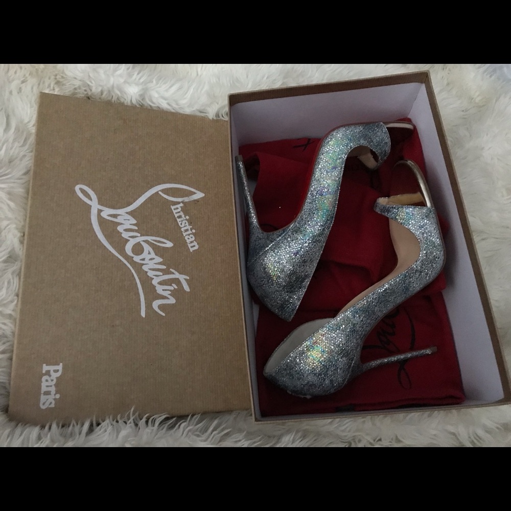 Christian Louboutin (Sparkly Red Bottoms)